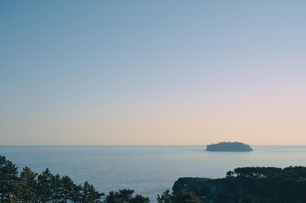 Jeju Poong Gyung Hotel Seogwipo-stad Buitenkant foto