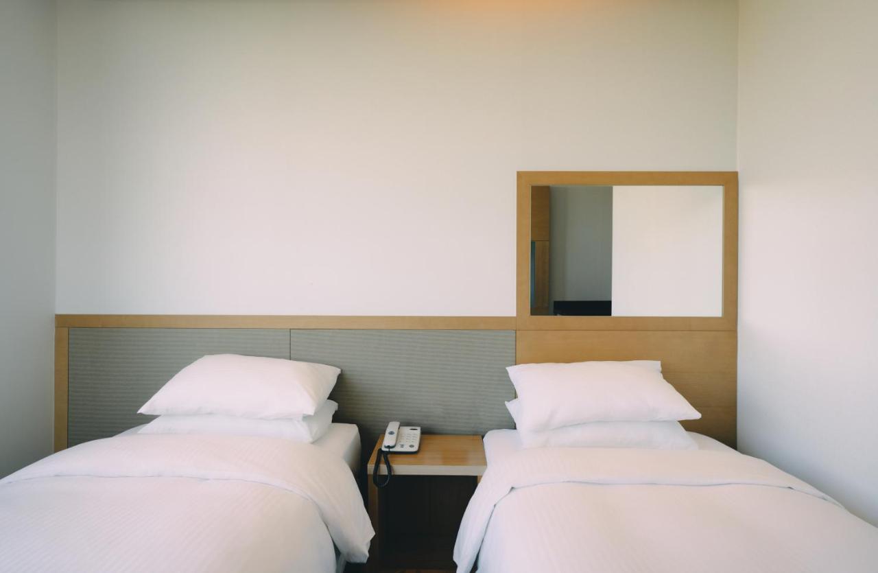 Jeju Poong Gyung Hotel Seogwipo-stad Buitenkant foto