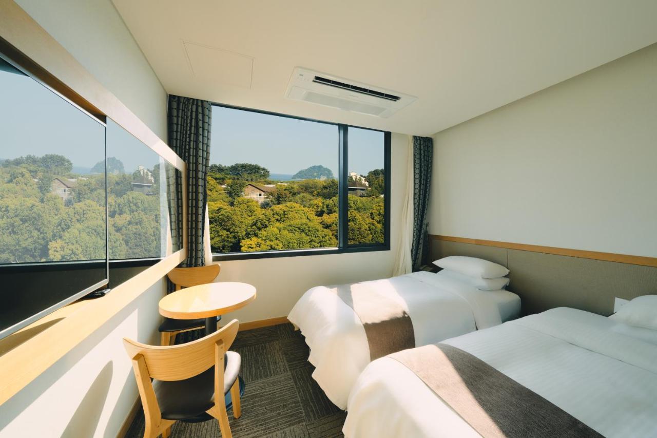 Jeju Poong Gyung Hotel Seogwipo-stad Buitenkant foto